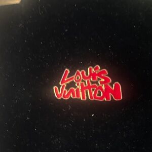 Louis Vuitton Red and silver tone  Script Logo Pin